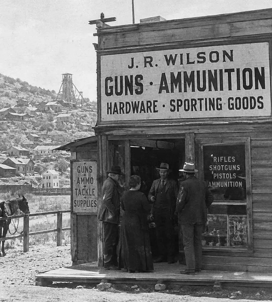 From the archive — Second Amendment Family GunShop Archival black and white photograph of a small family gun shop in Arizona